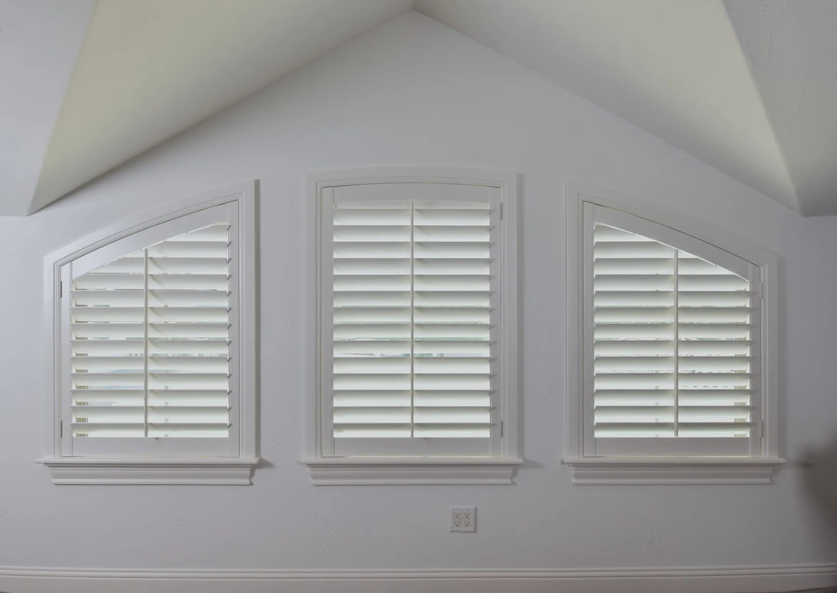 arched window plantation shutters